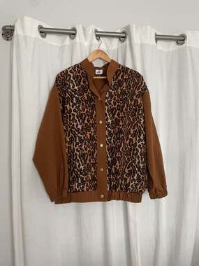 Sport Savvy Vintage 90s Leopard Print Patchwork Button Up Jacket
Animal
Track